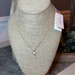 NWT Kate Spade Signature Spade Mini pendant dust bag included